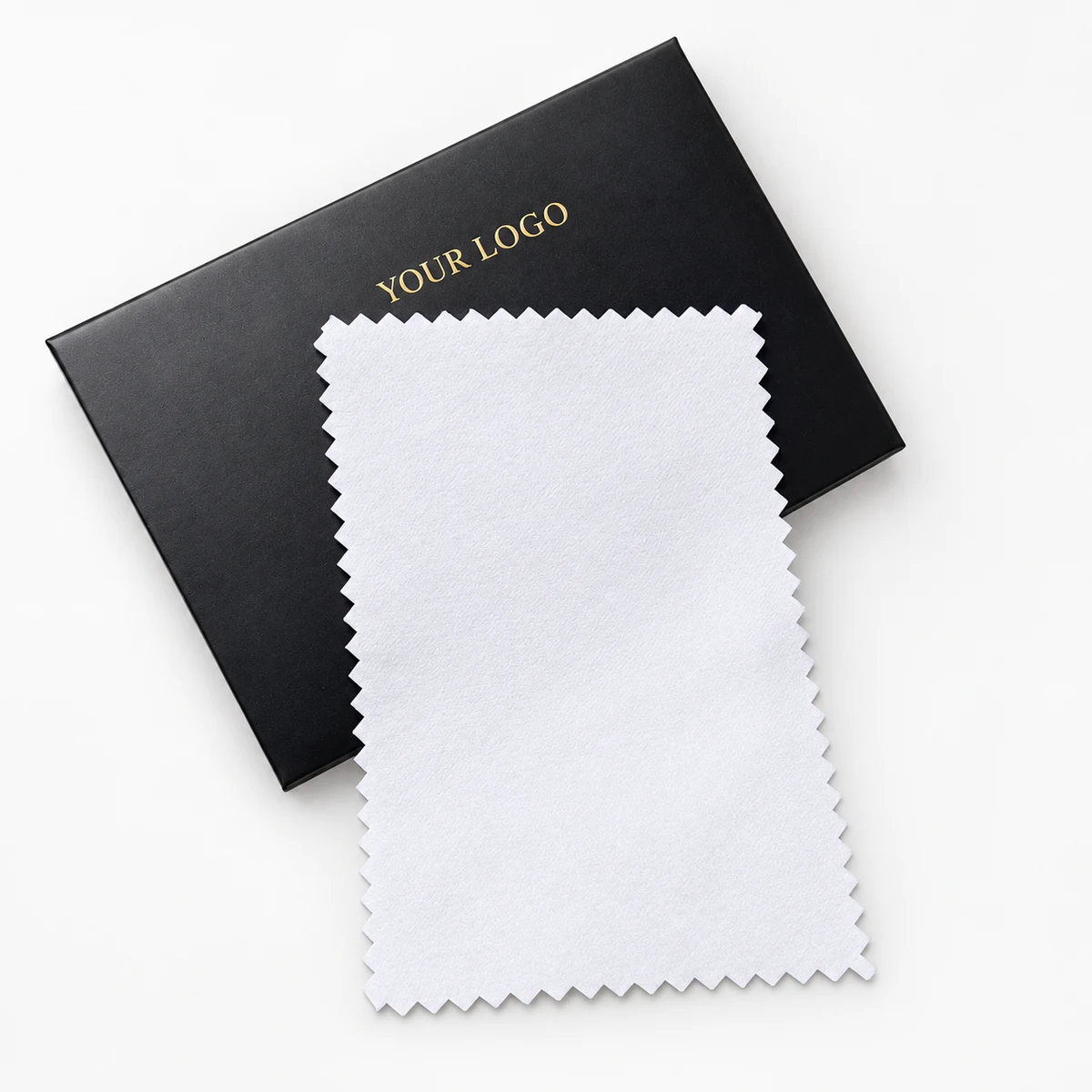 Black custom silver polishing cloth package with gold Your Logo print and a white cloth