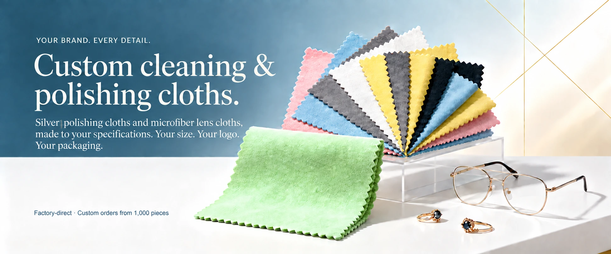 Custom cleaning and polishing cloths in assorted colors, with eyeglasses and rings