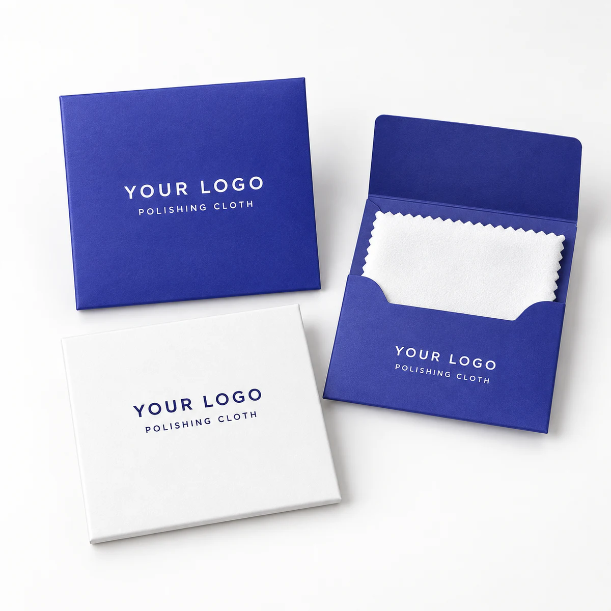 Blue and white custom logo paper envelopes for silver polishing cloths, including one open pack