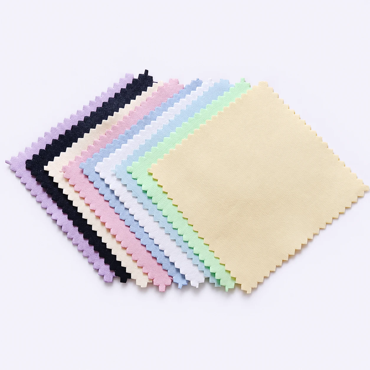 8 x 8 cm silver and jewelry polishing cloths in assorted colors, arranged in a fan